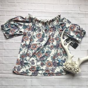 NWT Off The Shoulder With Slits In The Sleeve.